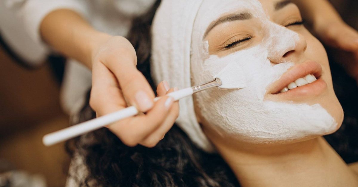 Woman visiting cosmetologist and making rejuvenation procedures